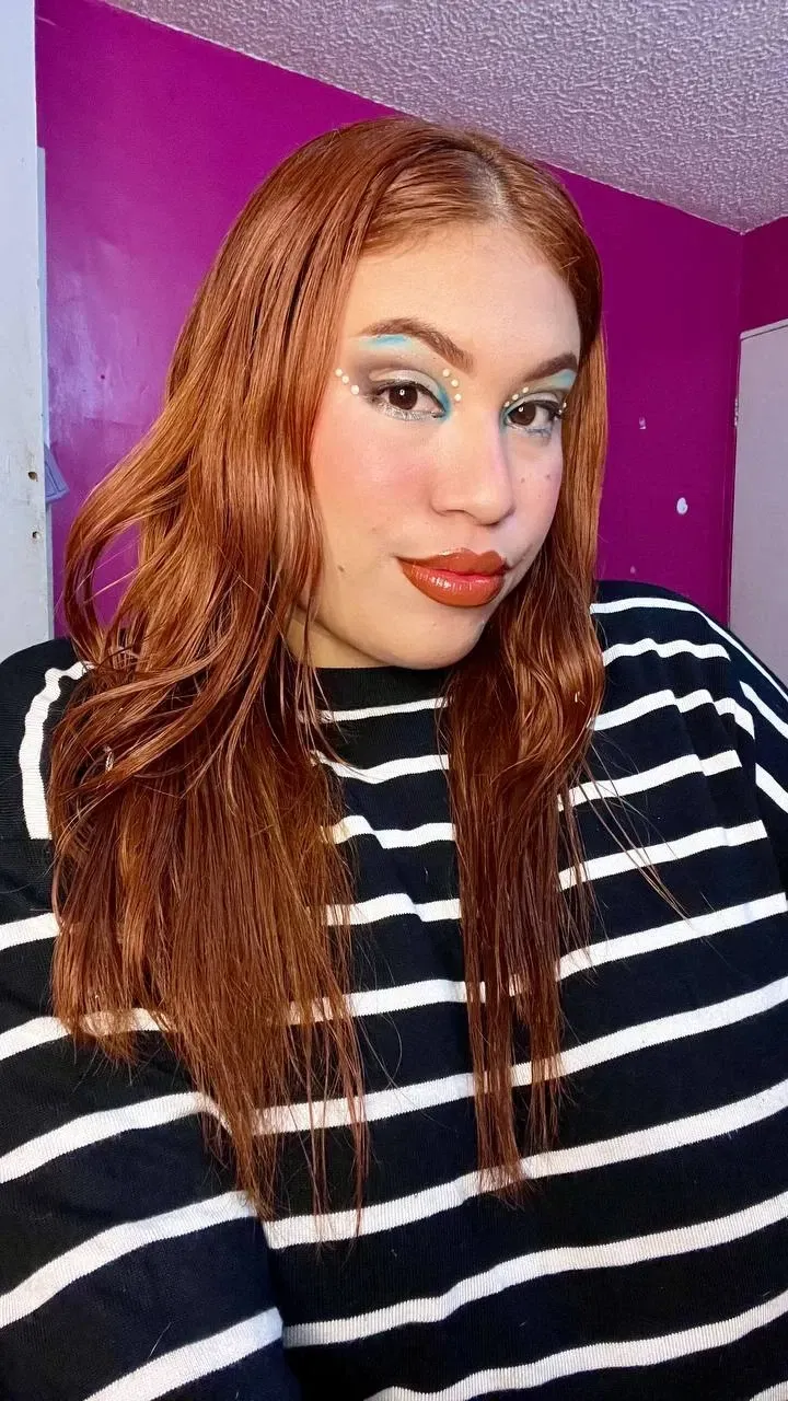 Blue and brown makeup with touches of white