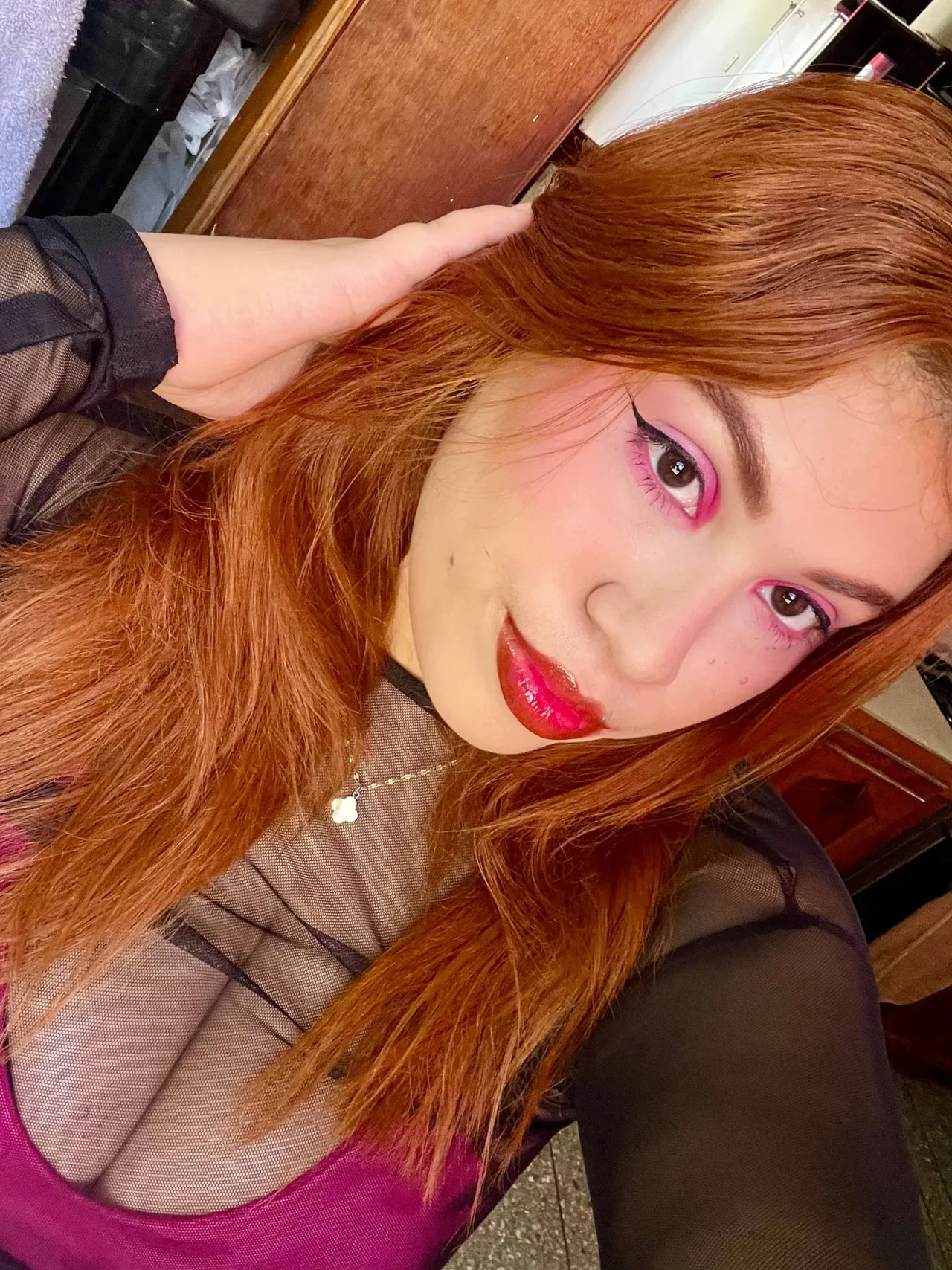Fuchsia Makeup with Symmetrical Eyeliner