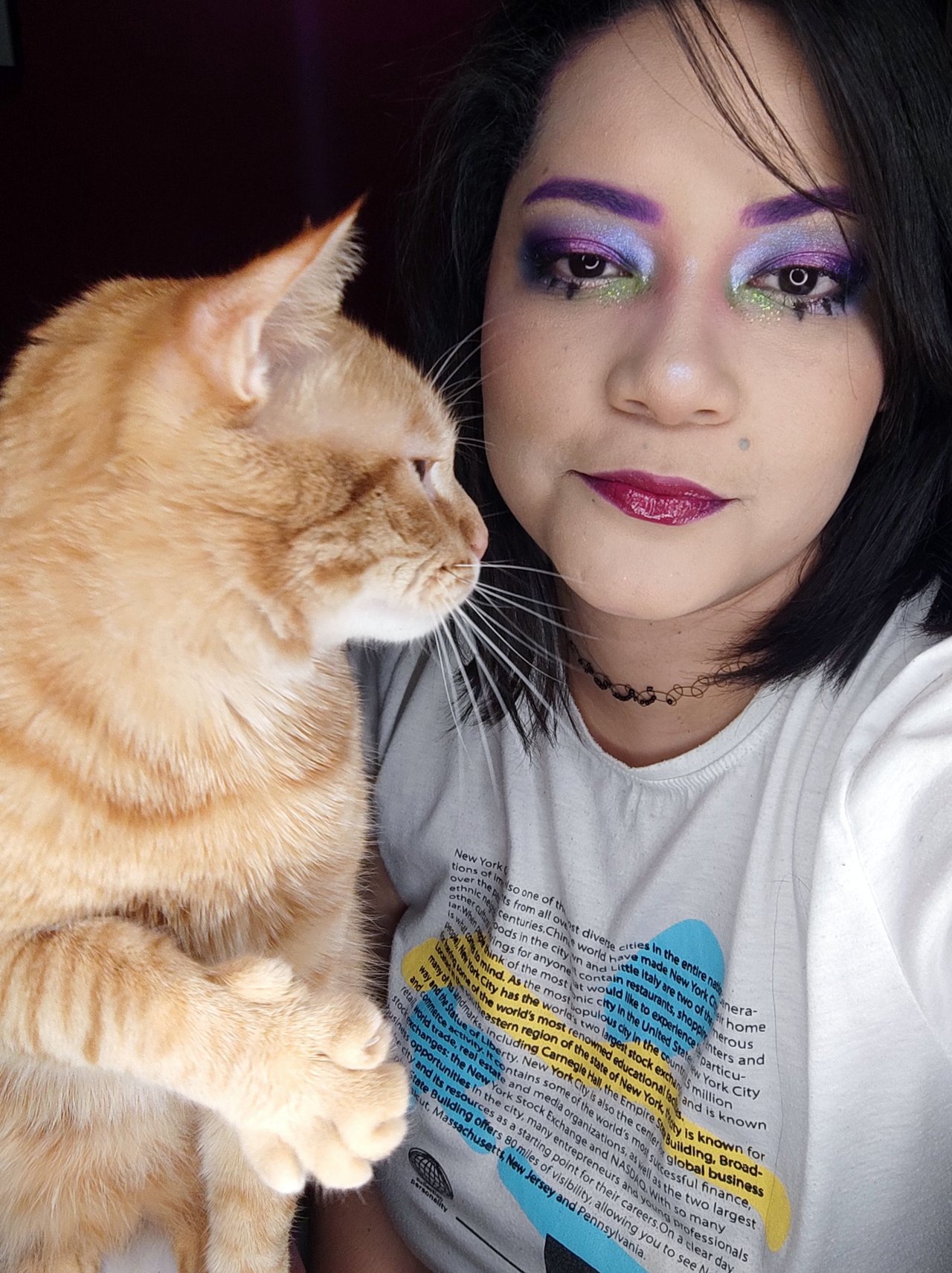 Colorful makeup with lots of shine