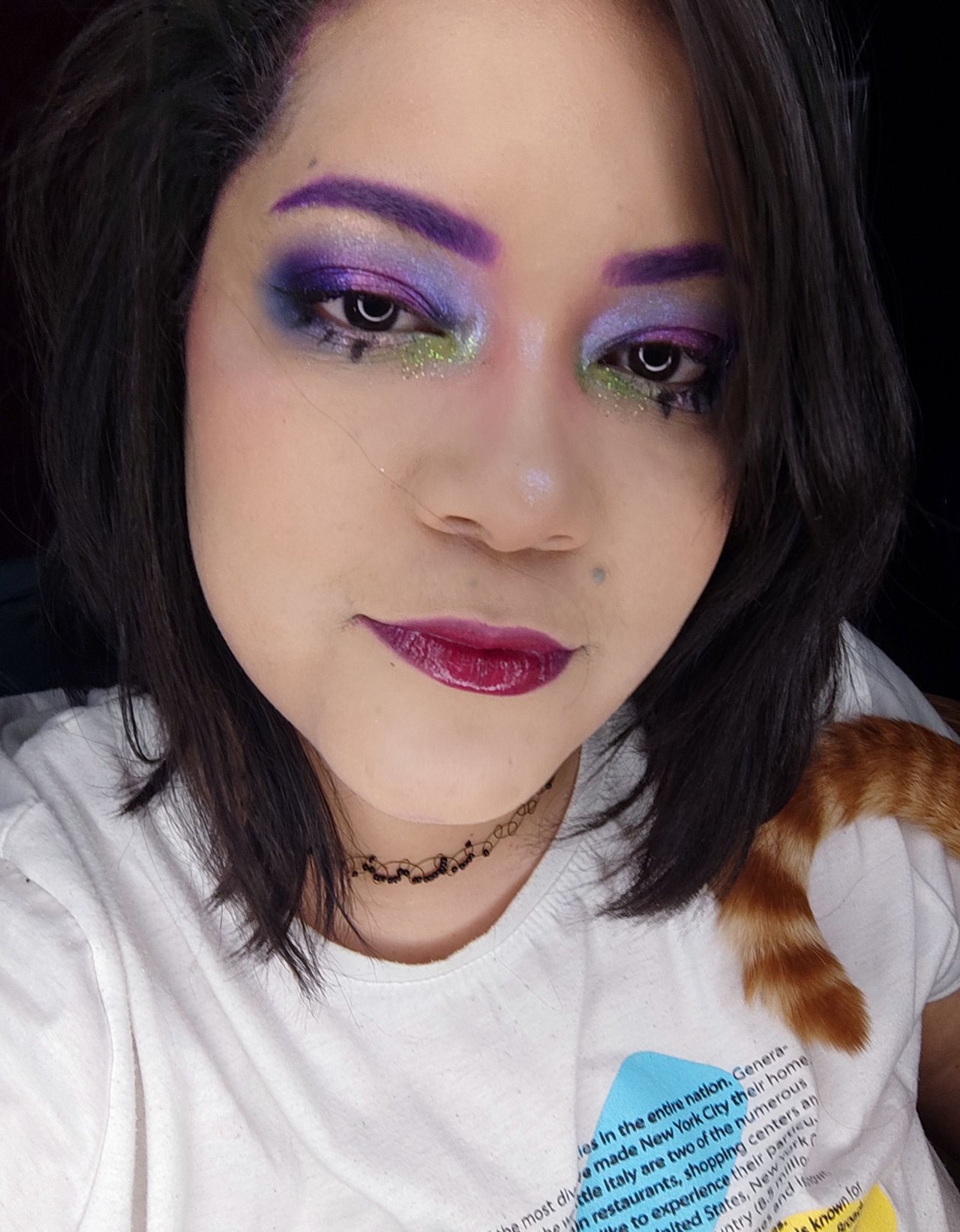 Colorful makeup with lots of shine