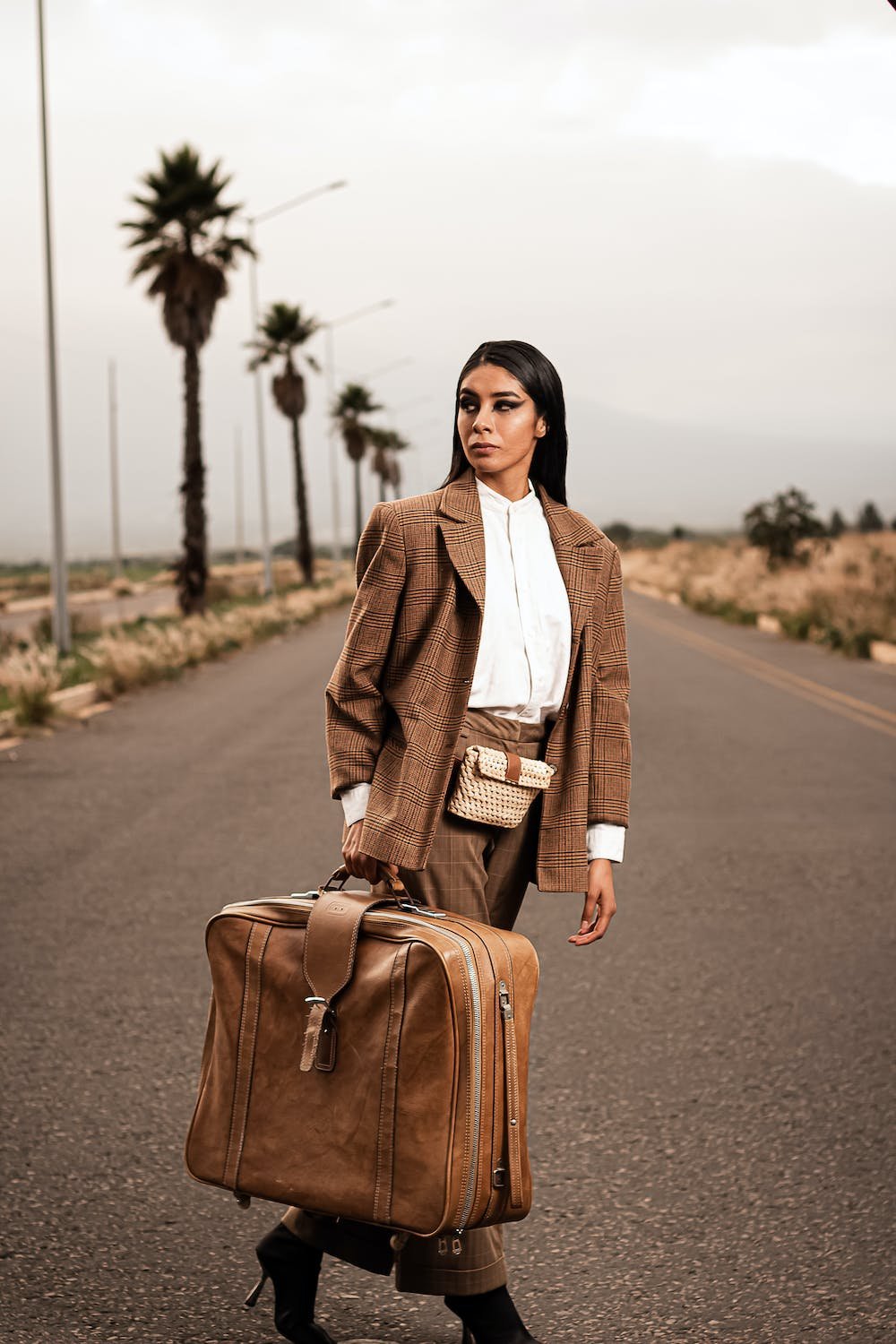 free-photo-of-woman-with-suitcase.jpeg