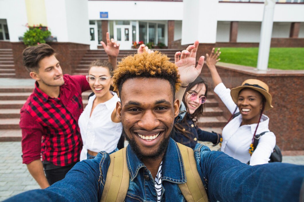 cheerful-students-posing-together-while-taking-photo_23-2147664382.jpg