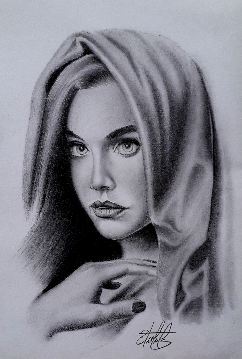 Face of a beautiful woman. Drawing created with graphite pencil Rostro  de una hermosa mujer. Dibujo creado con lápiz de grafito.