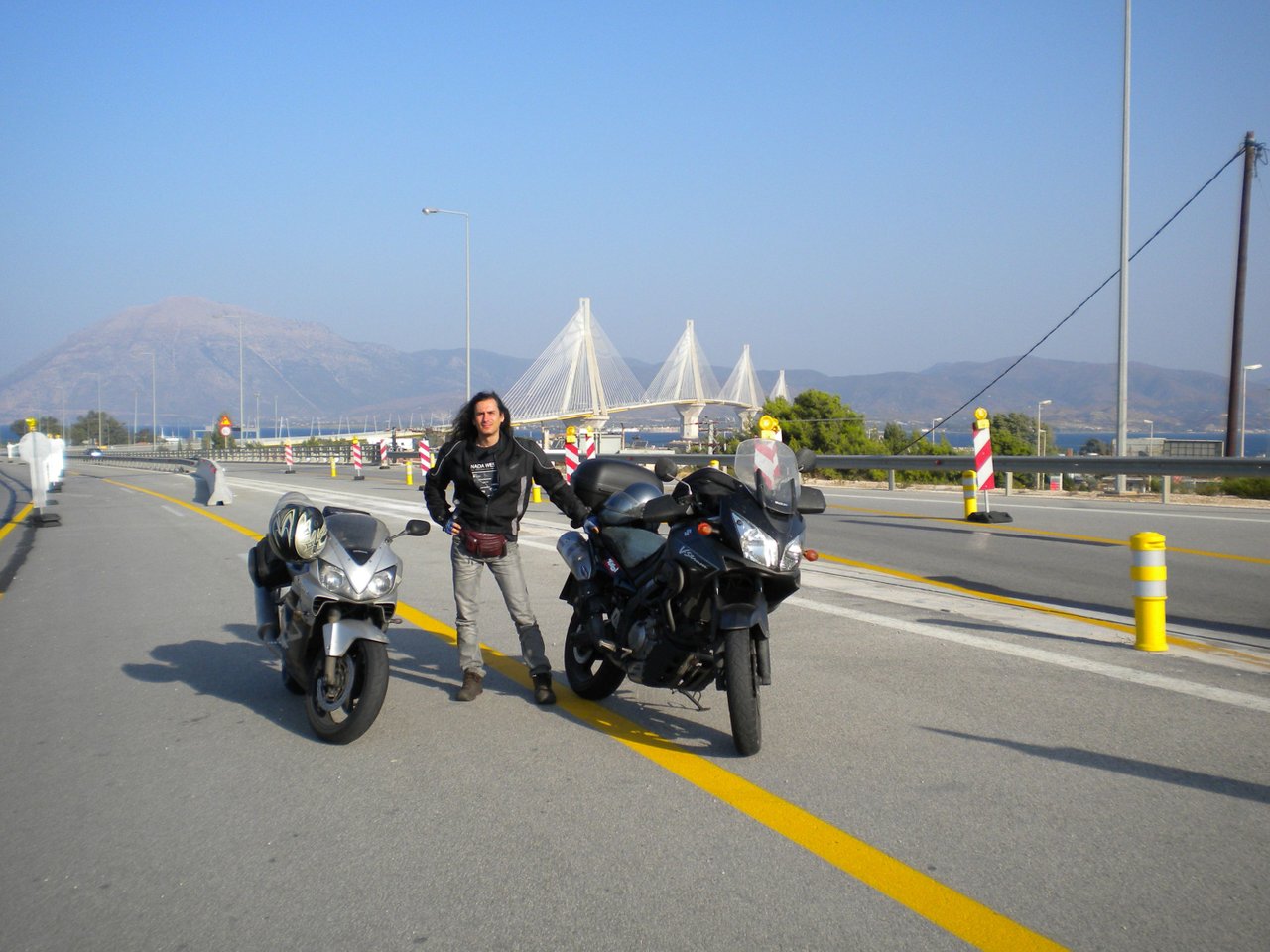 Orestis, bikes and again the huge bridge.JPG