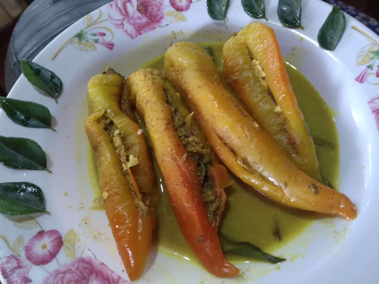 A delicious capsicums curry with egg filling, you'll love the look and taste of this curry.