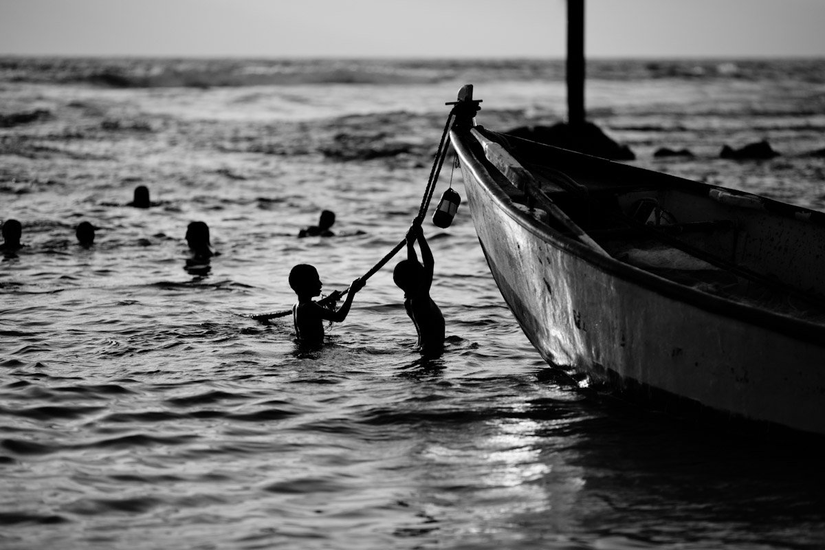 silhouettes in the water.jpg