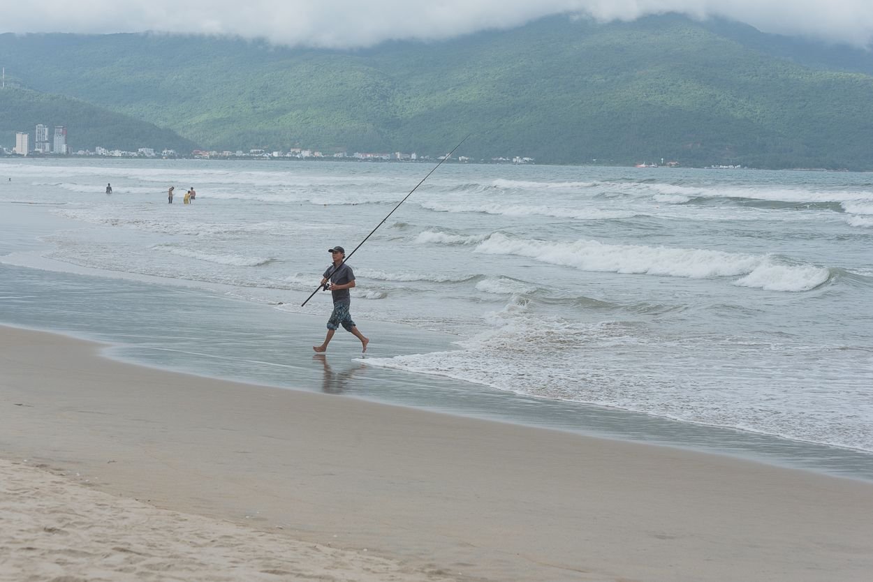 Surf Fishing, Vacationers, and Charming Waves at Da Nang Beach in