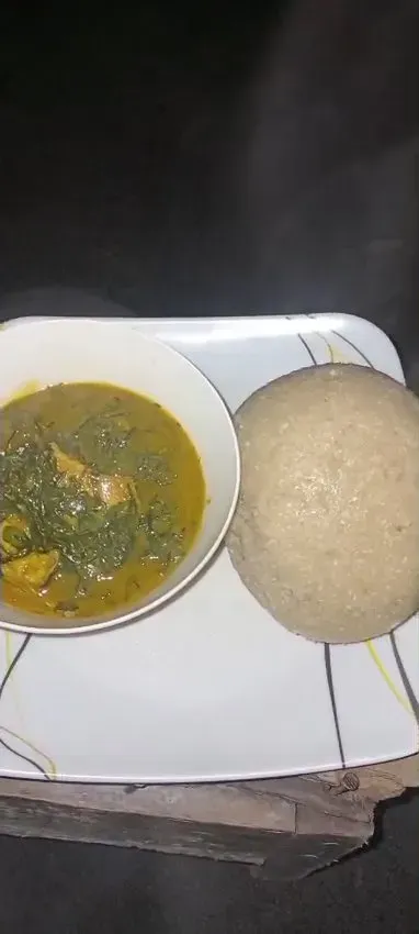 HOT EBA AND BITTERLEAF GOAT MEAT SOUP FROM NIGERIA WEST AFRICA