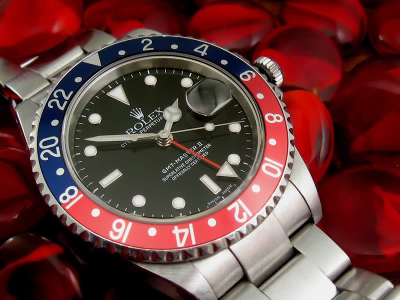 https://upload.wikimedia.org/wikipedia/commons/f/f1/Rolex_GMT_Master_II.jpg