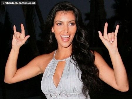 https://www.infiniteunknown.net/wp-content/uploads/2015/04/kim-kardashian-satanic-hand-sign.jpg