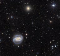 🌌 SpacePicture of a Day: Galaxies in the River: NGC 1300 and NGC 1297 🪐