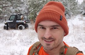 Going on a hike through the snow covered woods