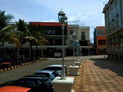 Old windows with sturdy frames with classic building ornaments that continue to evolve with the times 
