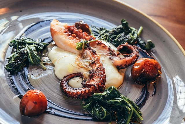 grilled octopus with greens