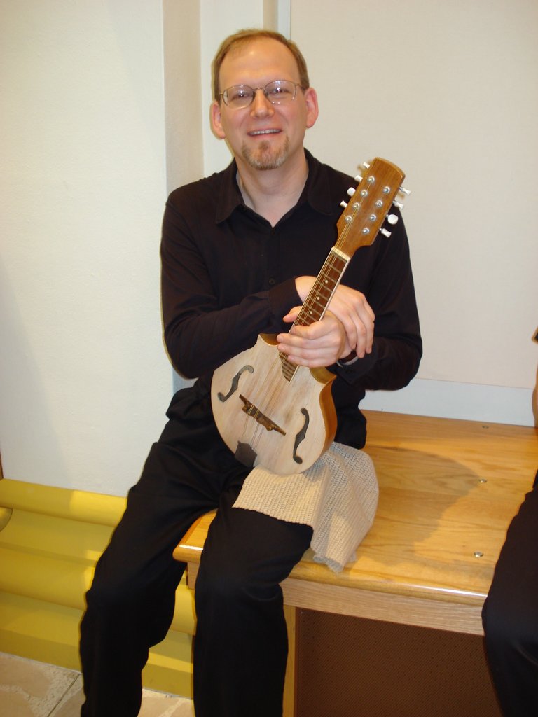 Bo Gulledge plays mandolin with the Louisville Mandolin Orchestra