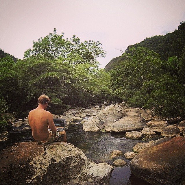 Coding in the river in the jungle