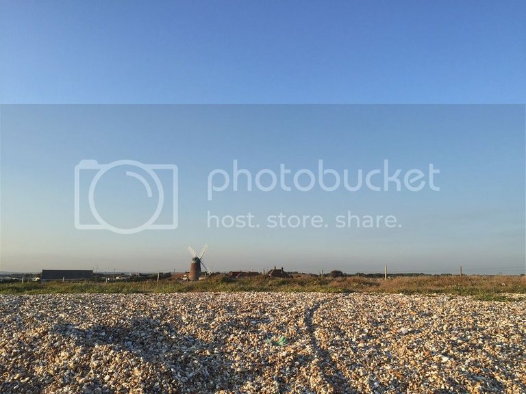 A distant view of the windmill