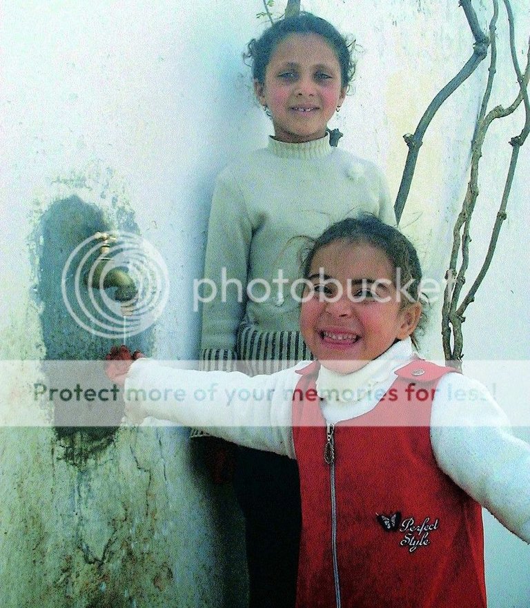 Kids happy to have a tap