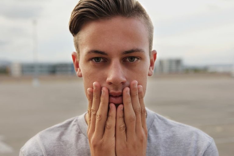 Attrative teenager looking directly into the camera