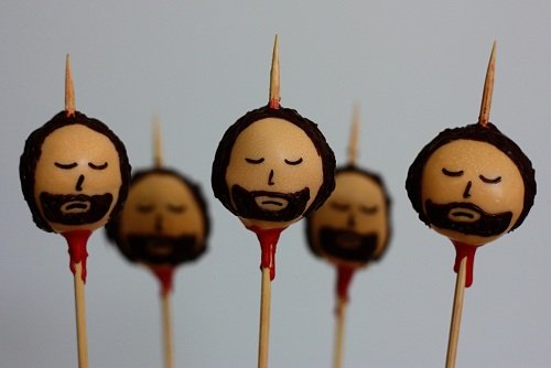 ned starks cake head on toothpick spikes