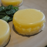 a lemon cake sits on a table