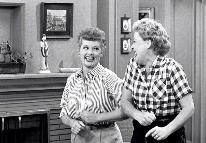 Lucy and Ethel Laughing Together
