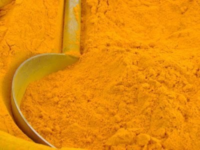 Abstract image of Indian tumeric powder from vegetable market.