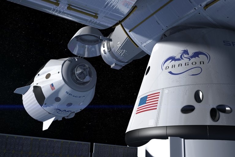 This artist's concept shows a SpaceX Crew Dragon docking with the International Space Station, as it will during a mission for NASA's Commercial Crew Program. NASA is partnering with Boeing and SpaceX to build a new generation of human-rated spacecraft capable of taking astronauts to the station and back to Earth, thereby expanding research opportunities in orbit.