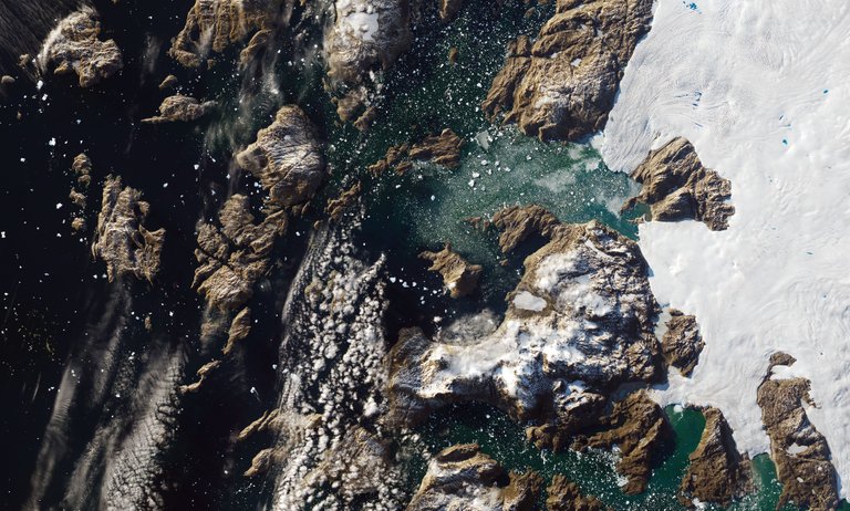 In July 2018, an iceberg weighing 11 million tons parked just offshore of Innaarsuit, a small island village in northwestern Greenland.