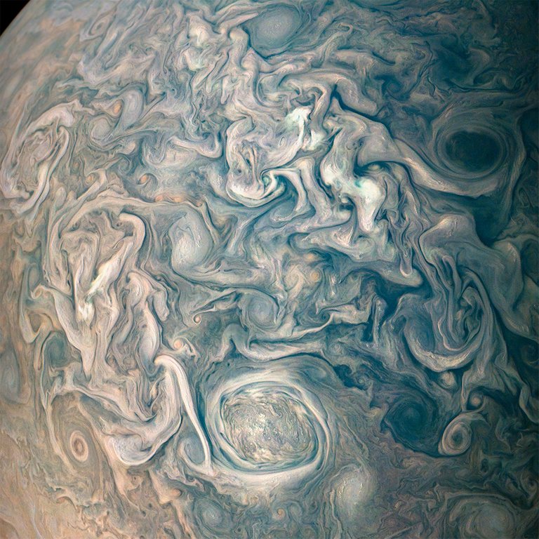 This image captures swirling cloud belts and tumultuous vortices within Jupiter’s northern hemisphere.