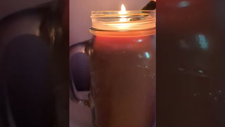Lighitng a candle in slow motion