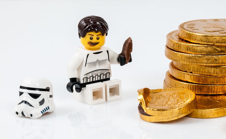 Lego storm trooper eating a chocolate coin