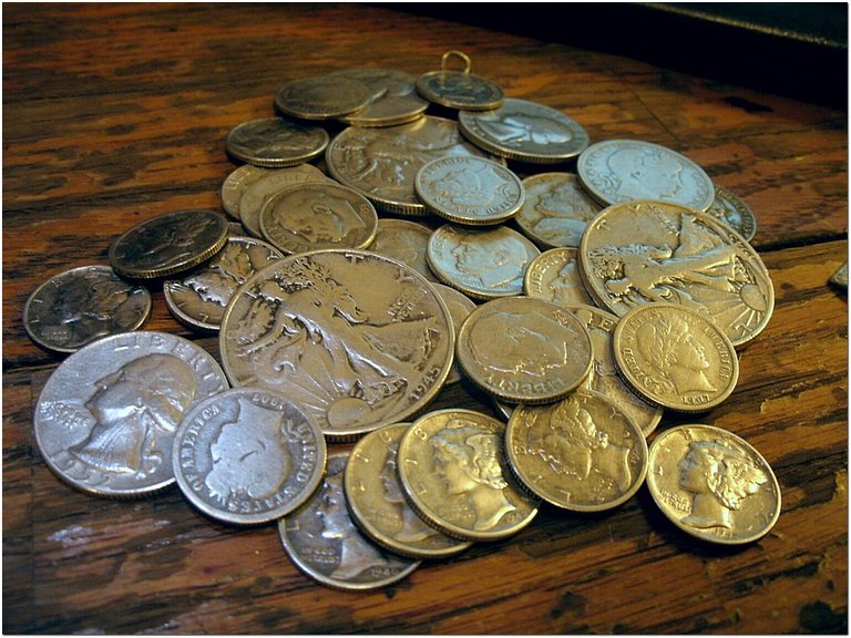 pile of silver coins
