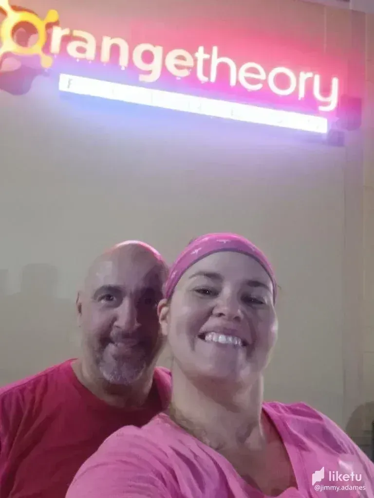 cl9ih8y6e00390ikcgzb6dadv_Reppin_Pink_Under_the_Orange_Lights.webp