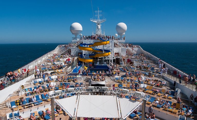 Passengers on a large cruise ship.