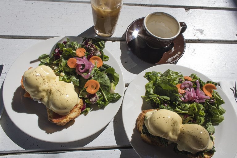 Eggs Benedict and coffees. Photo by daniellegiberti.