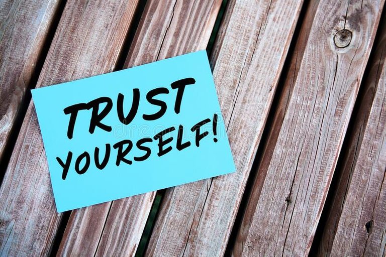 trust-yourself-motivational-inspirational-quote-handwritten-paper-wooden-table-self-confidence-concept-201632935.jpg