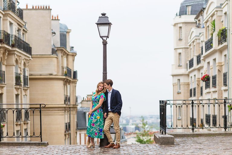 Paris-photographer-Christian-Perona-engagement-she-said-yes-love-Montmartre-cobblestones-street-green-dress-.jpg