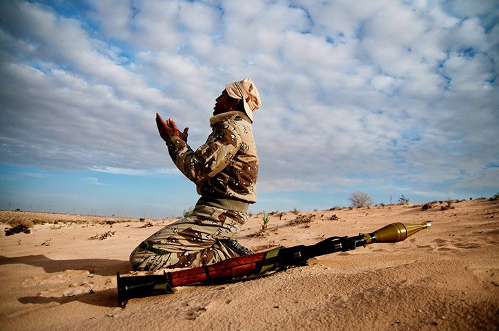 A-rebel-soldier-praying-b-017.jpg