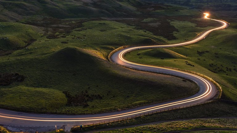 winding-road-lighted-shutterstock_616405244.jpg