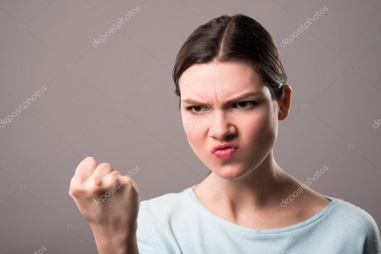 depositphotos_107000372-stock-photo-angry-girl-holding-hand-in.jpg