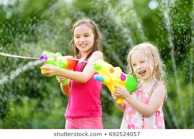 adorable-little-girls-playing-water-260nw-692524057.jpg