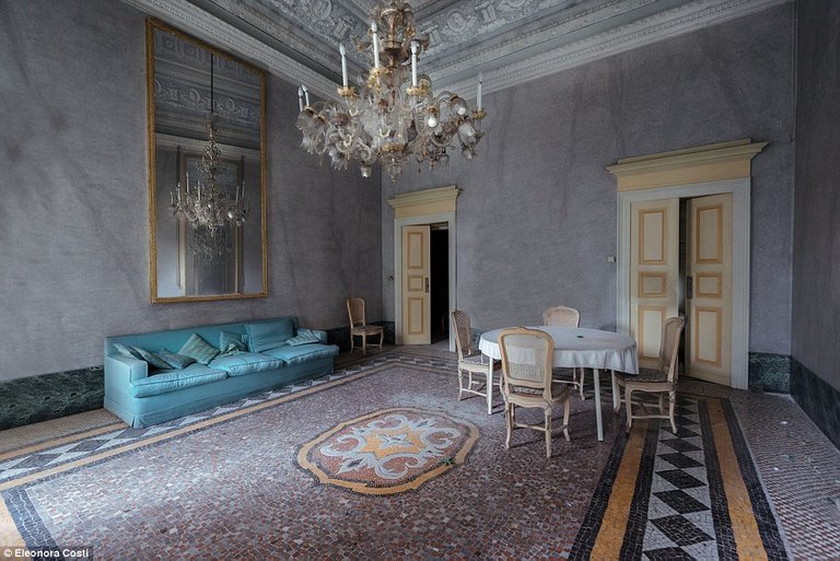 499C24ED00000578-5437251-Other_villas_such_as_this_one_with_a_blue_sofa_and_table_and_cha-a-15_1519679847374.jpg