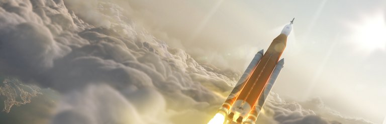 sls-70mt-dac3-orange3-inflight-through-clouds-uhr.jpg