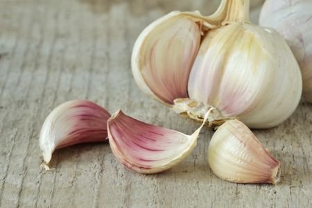 close-up-of-garlic-on-table-760254411-5bcbf91c4cedfd0026f2b89d.jpg