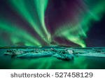 stock-photo-a-wonderful-night-with-kp-northern-lights-flying-over-the-glacier-lagoon-in-iceland-527458129.jpg