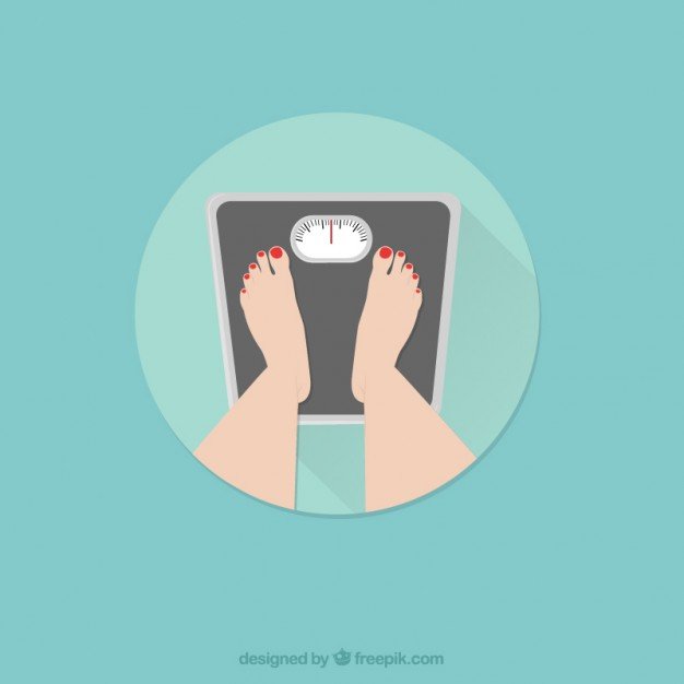 female-feet-standing-on-a-weight-scale_23-2147505259.jpg