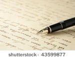 stock-photo-gold-fountain-pen-on-written-page-crisp-focus-on-nib-of-pen-43599877.jpg