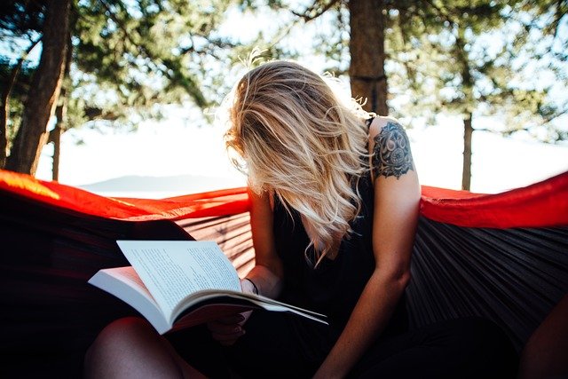 girl reading book in hammock.jpg