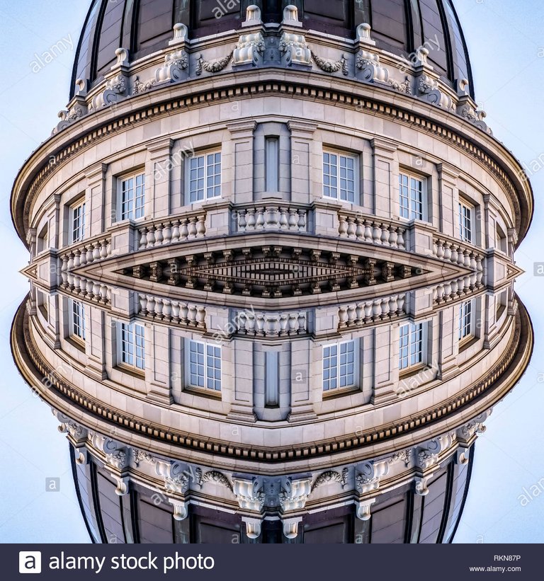 reflection-of-utah-state-capital-building-vertical-geometric-kaleidoscope-pattern-on-mirrored-axis-of-symmetry-reflection-colorful-shapes-as-a-wallp-RKN87P.jpg